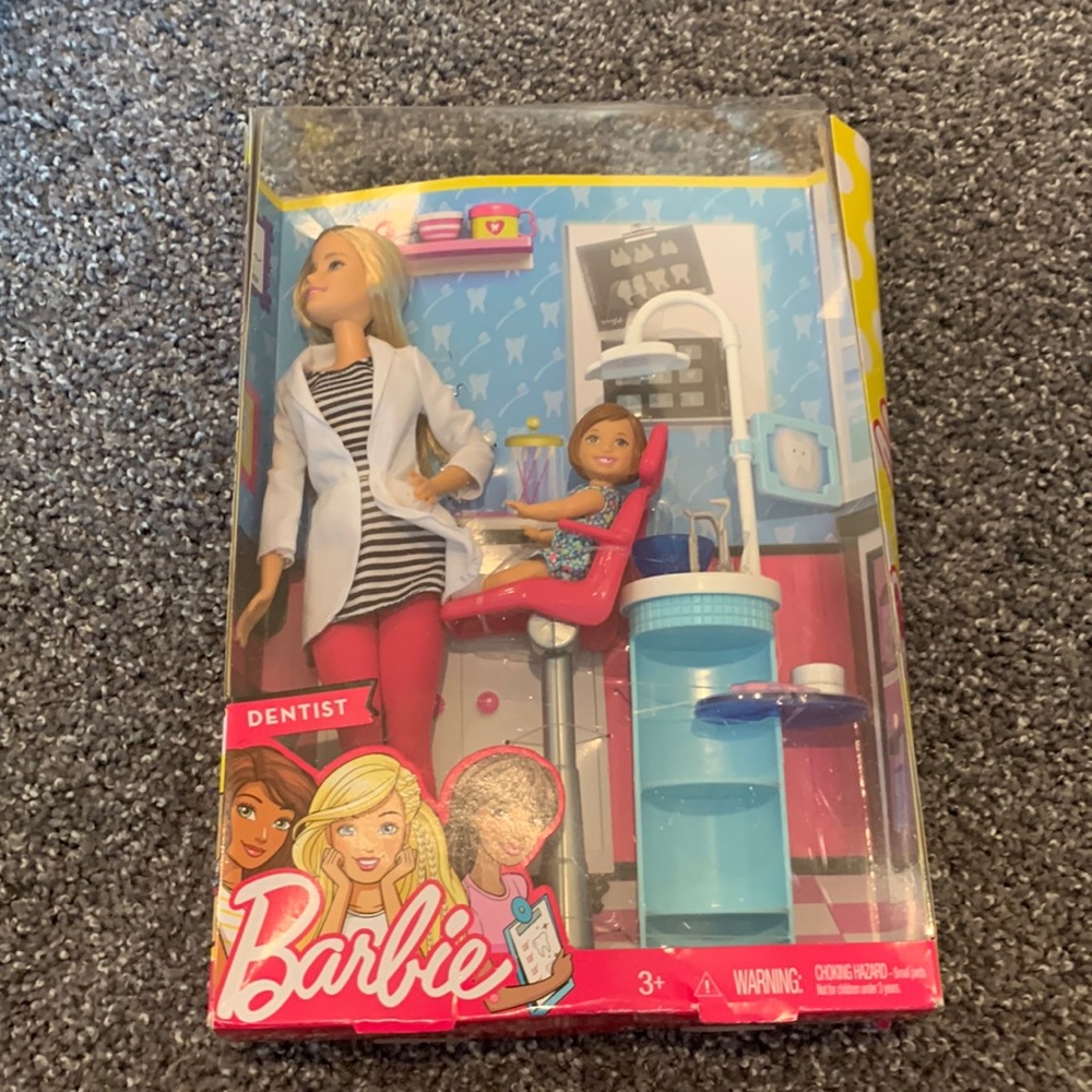 This is a brand new, never opened dentist barbie